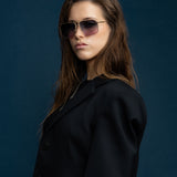 FONDA Brushed Gold Sunglasses by Tribu Eyewear — Deep Ocean, on-face studio view.