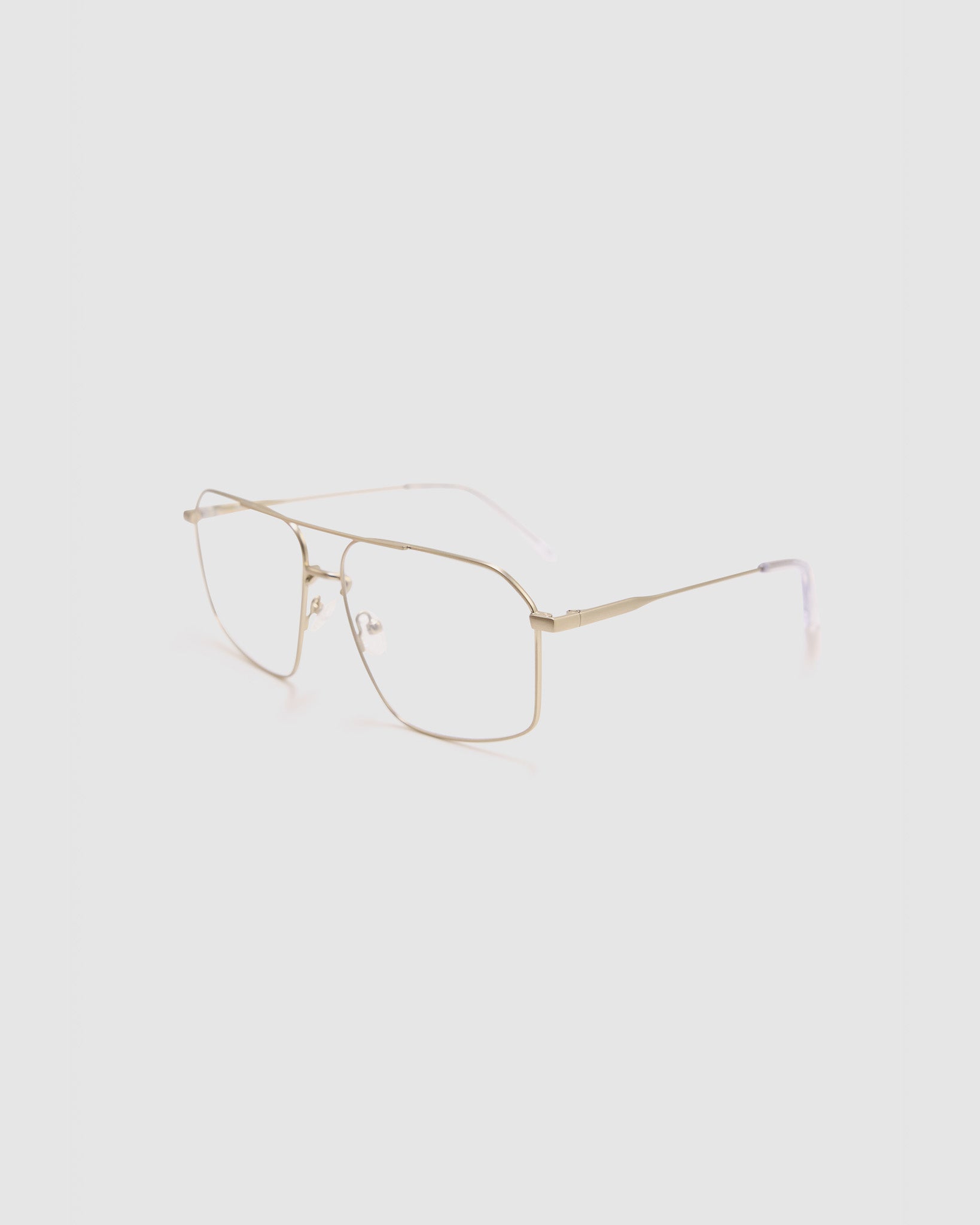 Fonda Brushed Silver Optical by Tribu Eyewear — Fine wire metal frame, side view studio lighting.