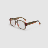 The DON Optical by Tribu Eyewear — Burgundy on Smoke Aviator frame, side view studio lighting.