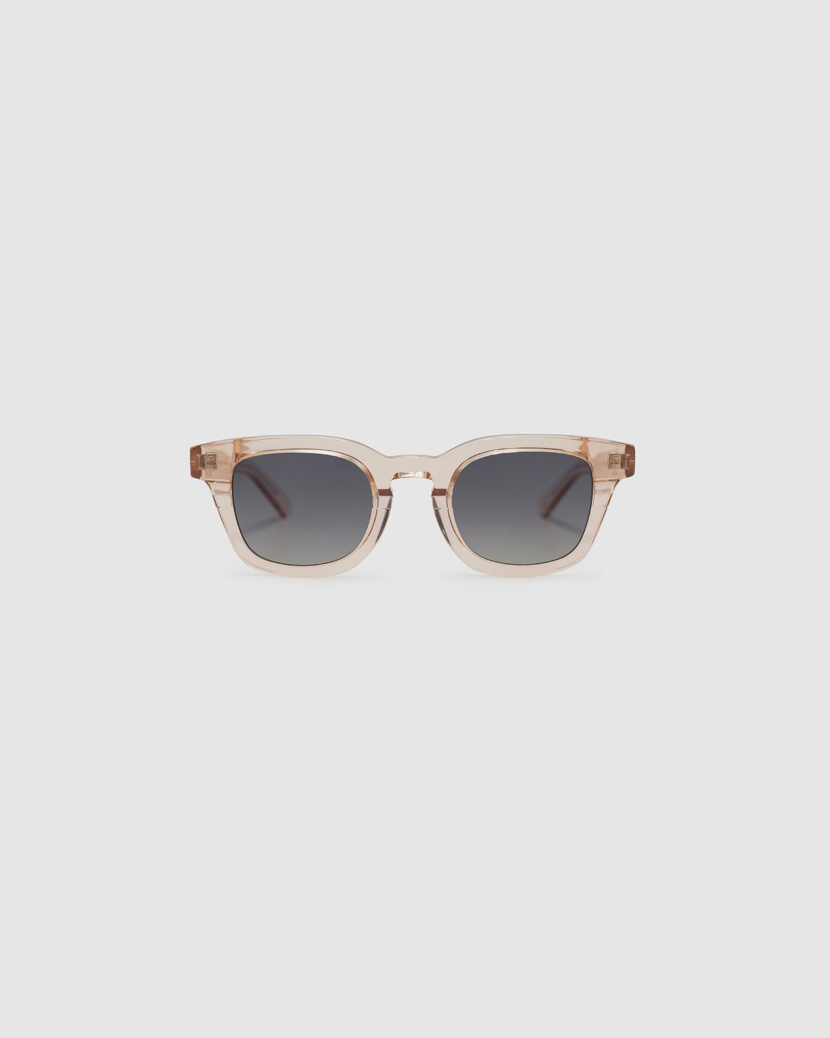 Bowie polarised sunglasses by TRIBU Eyewear champagne crystal acetate, front view on light grey background.