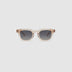 Bowie polarised sunglasses by TRIBU Eyewear champagne crystal acetate, front view on light grey background.