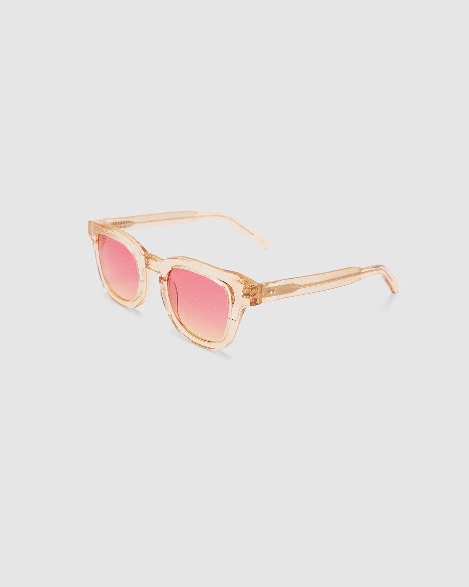 Bowie sunglasses with soft pink gradient tinted lenses in champagne crystal acetate, side view