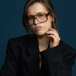 The DON Optical by Tribu Eyewear — Burgundy on Smoke Aviator frame, model wearing front view studio lighting. 