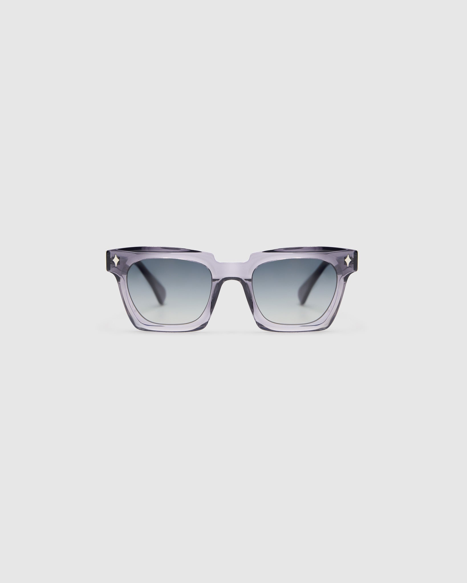 Brutal 1.0 Polarised Sunglasses by Tribu Eyewear — Smoke rectangular acetate frame, grey grad lens, front view light grey background.