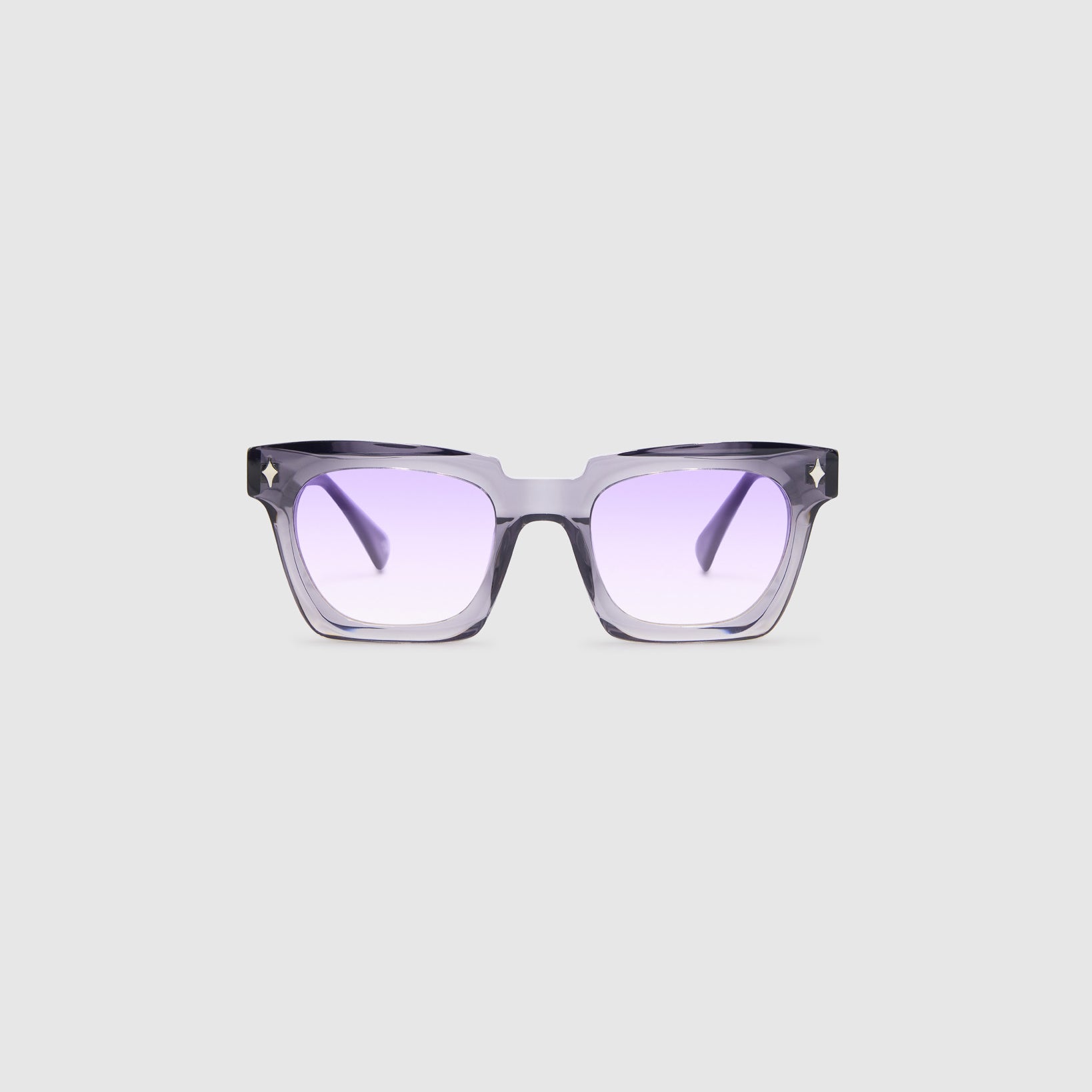 Brutal 1.0 Sunglasses — Smoke acetate frame, virgin violet lens, front view light grey background.