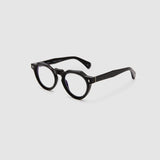 Brutal 2.0 Optical by Tribu Eyewear — Black round optical frame, side view studio lighting. 