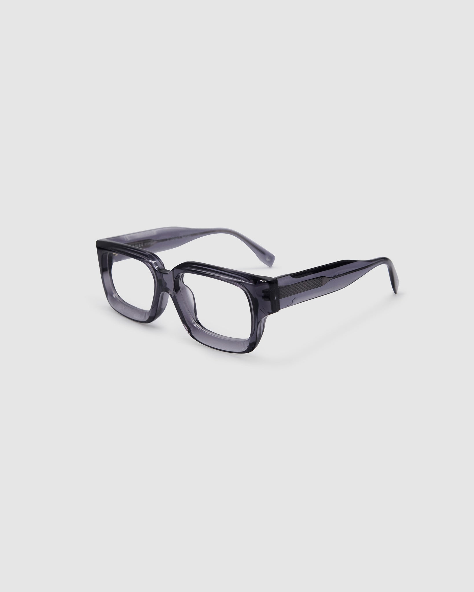 Brutal 3.0 Optical by Tribu Eyewear — Smoke Crystal square optical frame, side view studio lighting. 