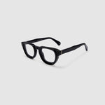 Brutal 4.0 Optical by Tribu Eyewear — Black round optical frame, side view studio lighting. 