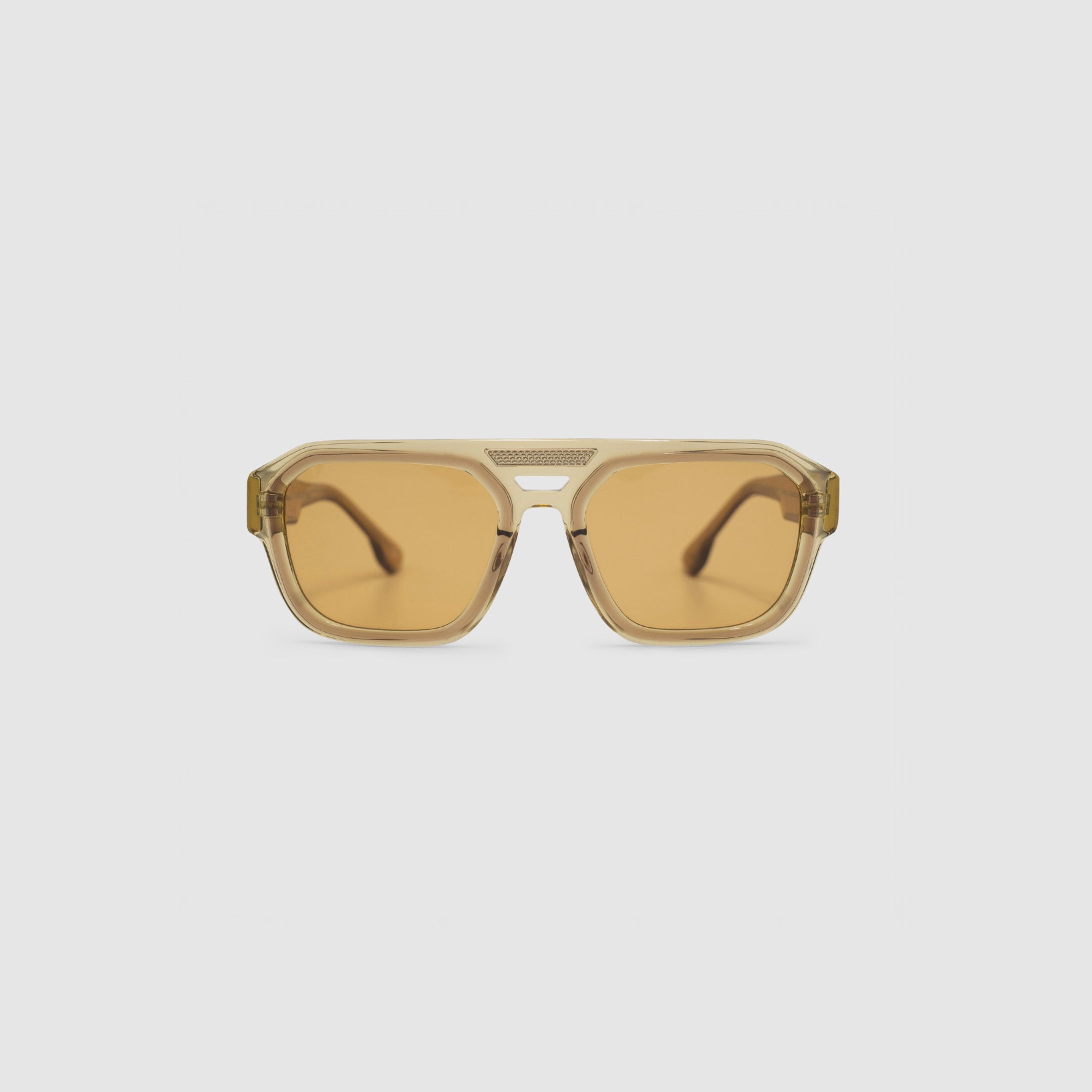Marley Sunglasses by — Champagne aviator acetate frame, desert orange lens, front view light grey background.
