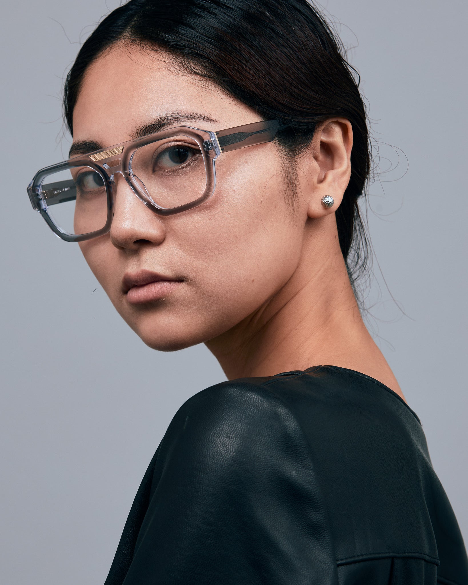 Marley Optical by Tribu Eyewear — Smoke crystal acetate aviator optical frame, female model. 