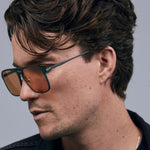 Oscar Sunglasses by Tribu Eyewear — Forest Green Aluminium Aviator frame, Desert Orange lens male model, white background