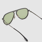 TRIBU Carbon 1.0 Gun carbon fibre sunglasses with sage green lenses, detailed view.
