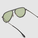 TRIBU Carbon 1.0 Gun carbon fibre sunglasses with sage green lenses, detailed view.