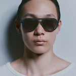 Model wearing TRIBU Carbon 1.0 black carbon aviator sunglasses - Front view 