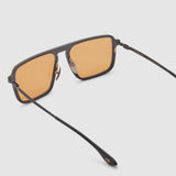 TRIBU Carbon 2.0 Black carbon fibre sunglasses with desert orange lenses, detailed view.