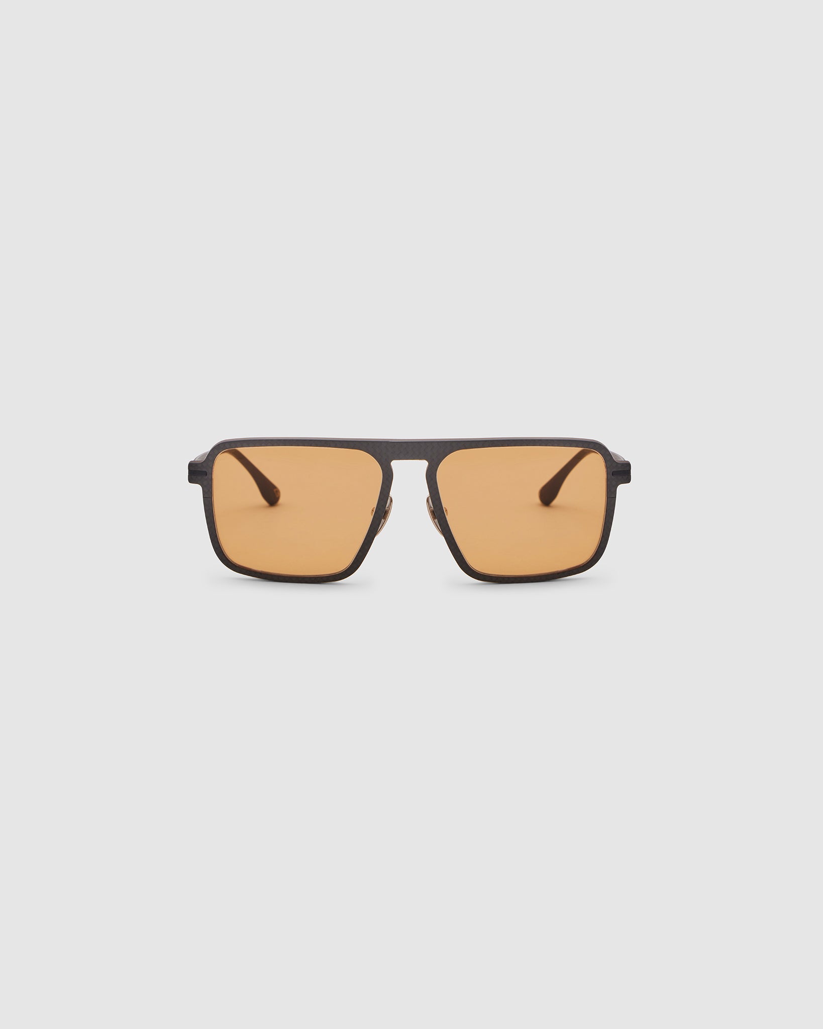 TRIBU Carbon 2.0 Black carbon fibre sunglasses with desert orange lenses, front view.