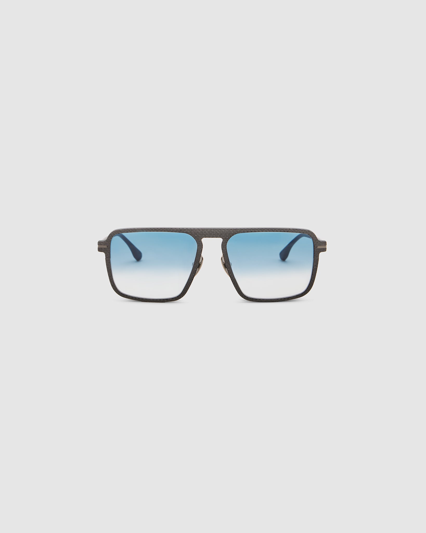TRIBU Carbon 2.0 Gun carbon fibre sunglasses with blue fade lenses, front view.