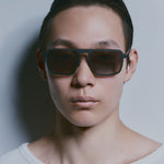 Model wearing TRIBU Carbon 2.0 black carbon fibre square aviator sunglasses - Front view 