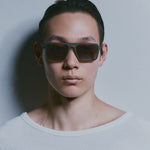 Model wearing TRIBU Carbon 2.0 gun carbon fibre square aviator sunglasses - Front view 