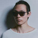Model wearing TRIBU Carbon 2.0 gun carbon fibre square aviator sunglasses - side view 