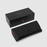 TRIBU EGO premium eyewear packaging featuring a black presentation box and premium protective case.