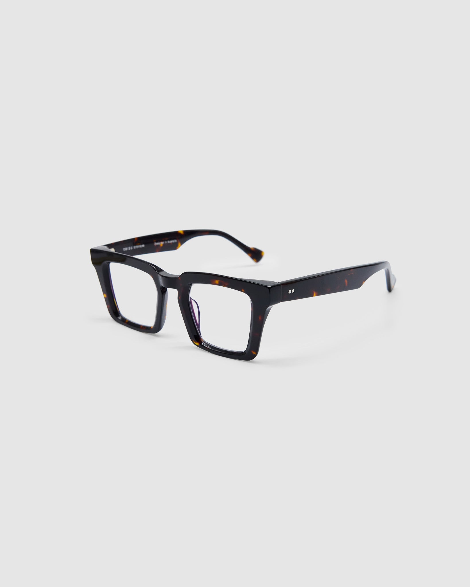 Aya Optical by Tribu Eyewear — Tortoiseshell optical frame, side view studio lighting. 