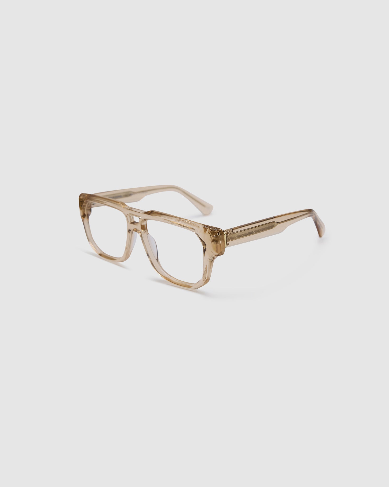 Billie Optical by Tribu Eyewear — Champagne Crystal Aviator optical frame, detailed view studio lighting. 
