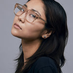 Billie Optical by Tribu Eyewear — Champagne Crystal Aviator optical frame, model wearing studio lighting. 