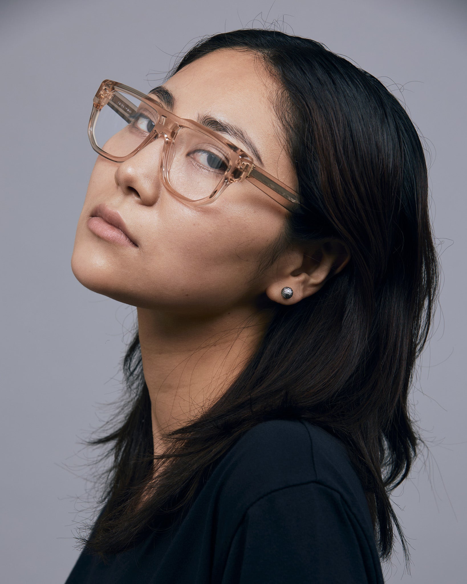 Billie Optical by Tribu Eyewear — Champagne Crystal Aviator optical frame, model wearing studio lighting. 