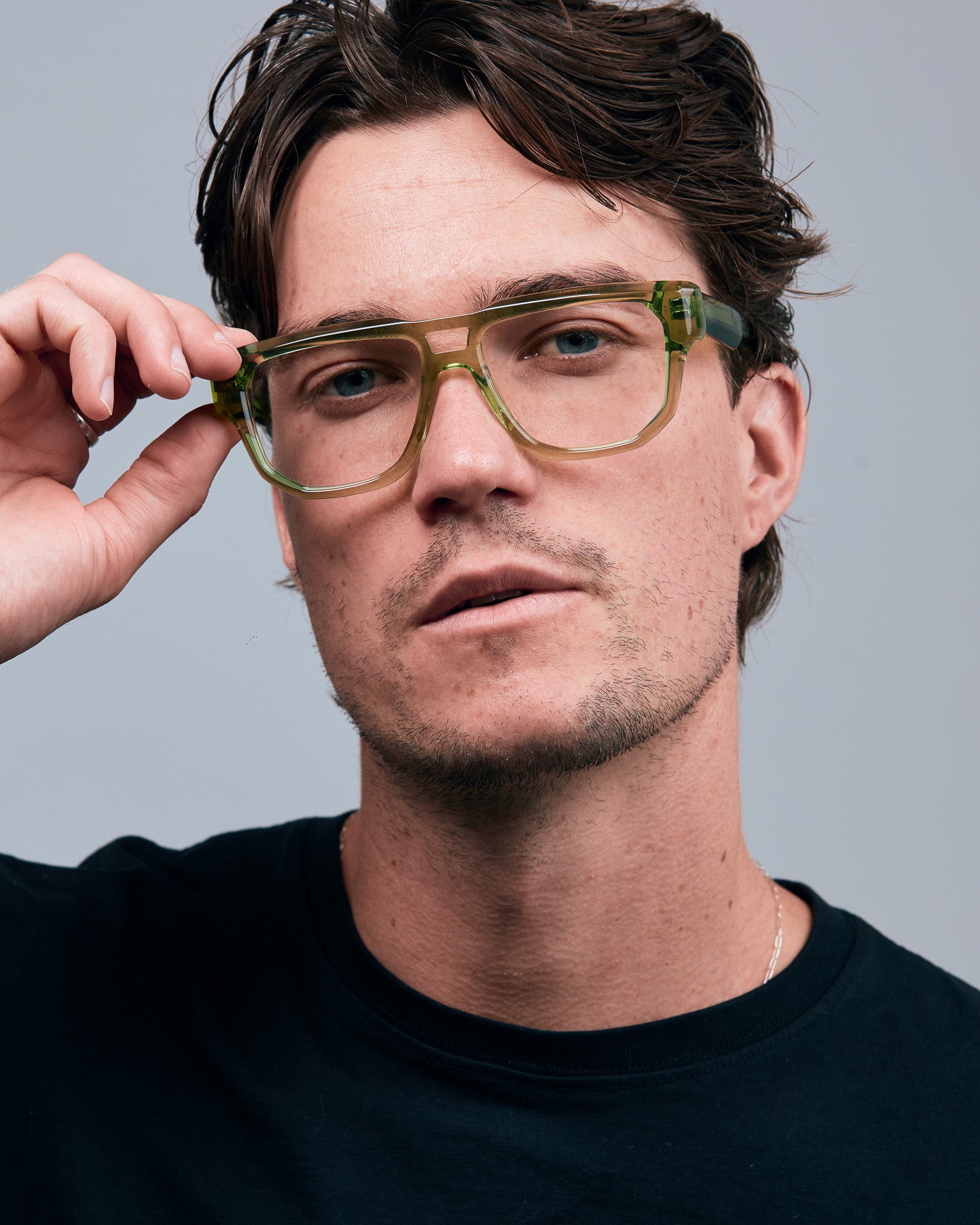 Billie Optical by Tribu Eyewear — Grass Aviator optical frame, male model studio lighting. 