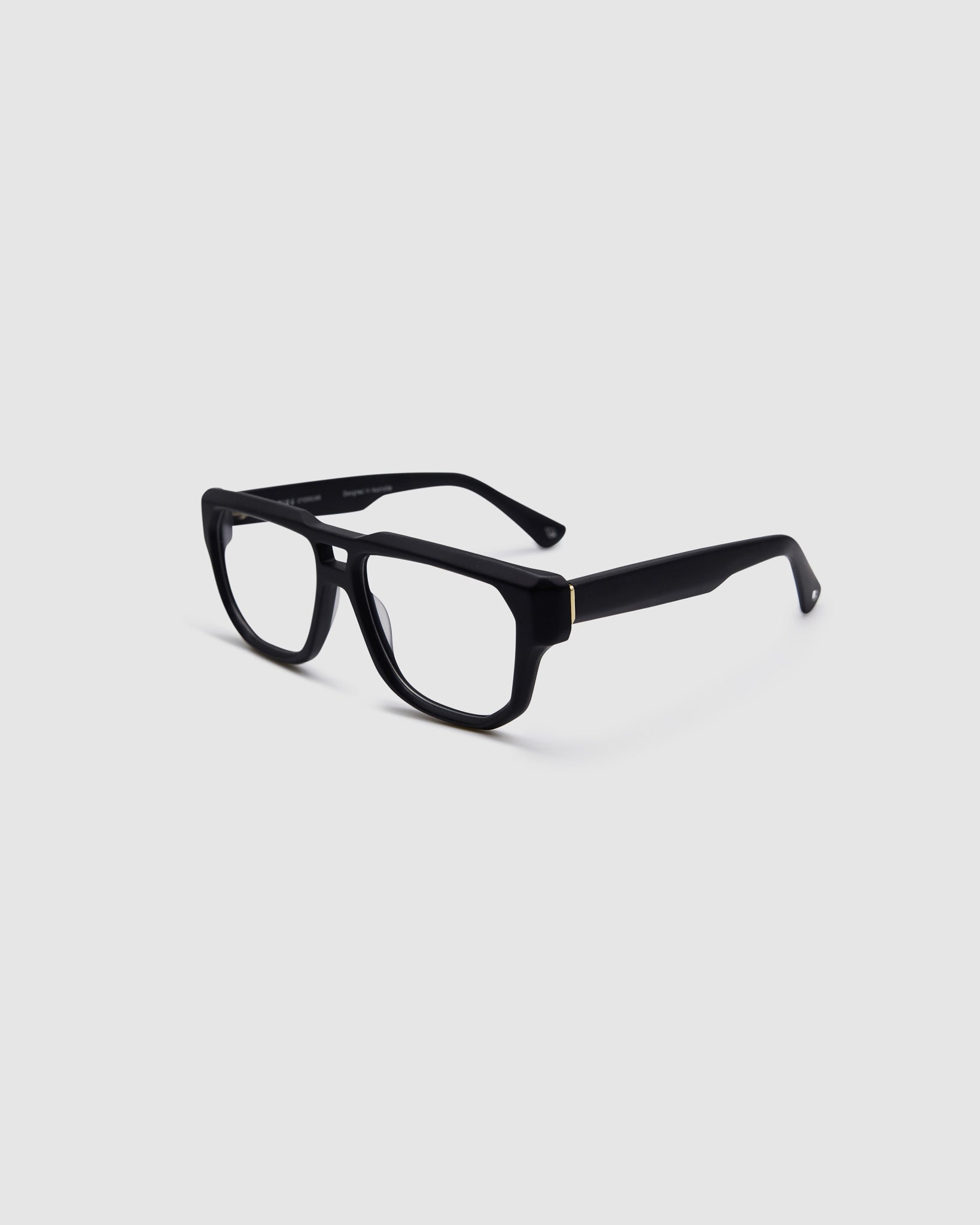 Billie Optical by Tribu Eyewear — Matte Black Aviator optical frame, side view studio lighting. 
