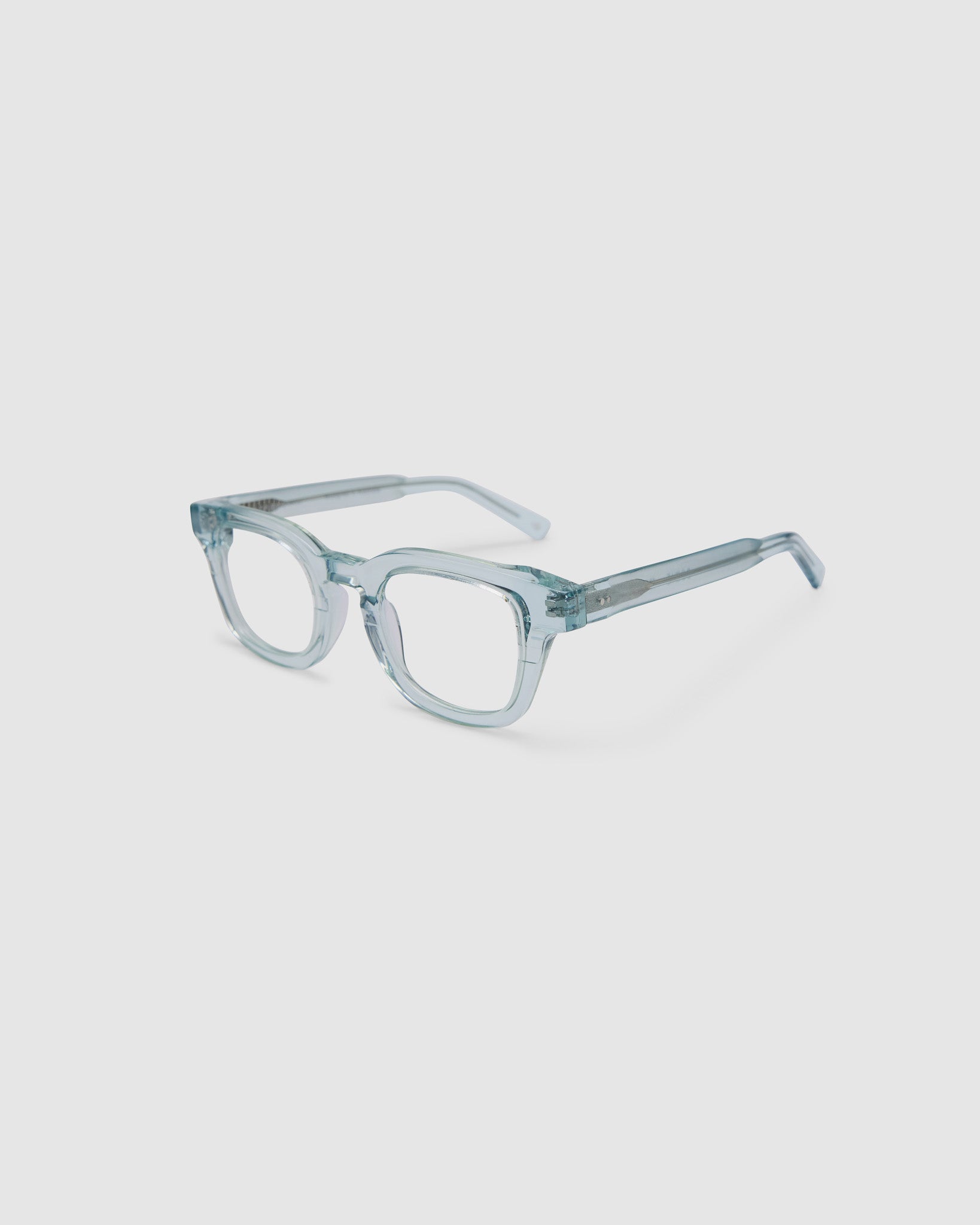 Bowie Optical by Tribu Eyewear — Baby Blue Crystal optical frame, side view studio lighting. 