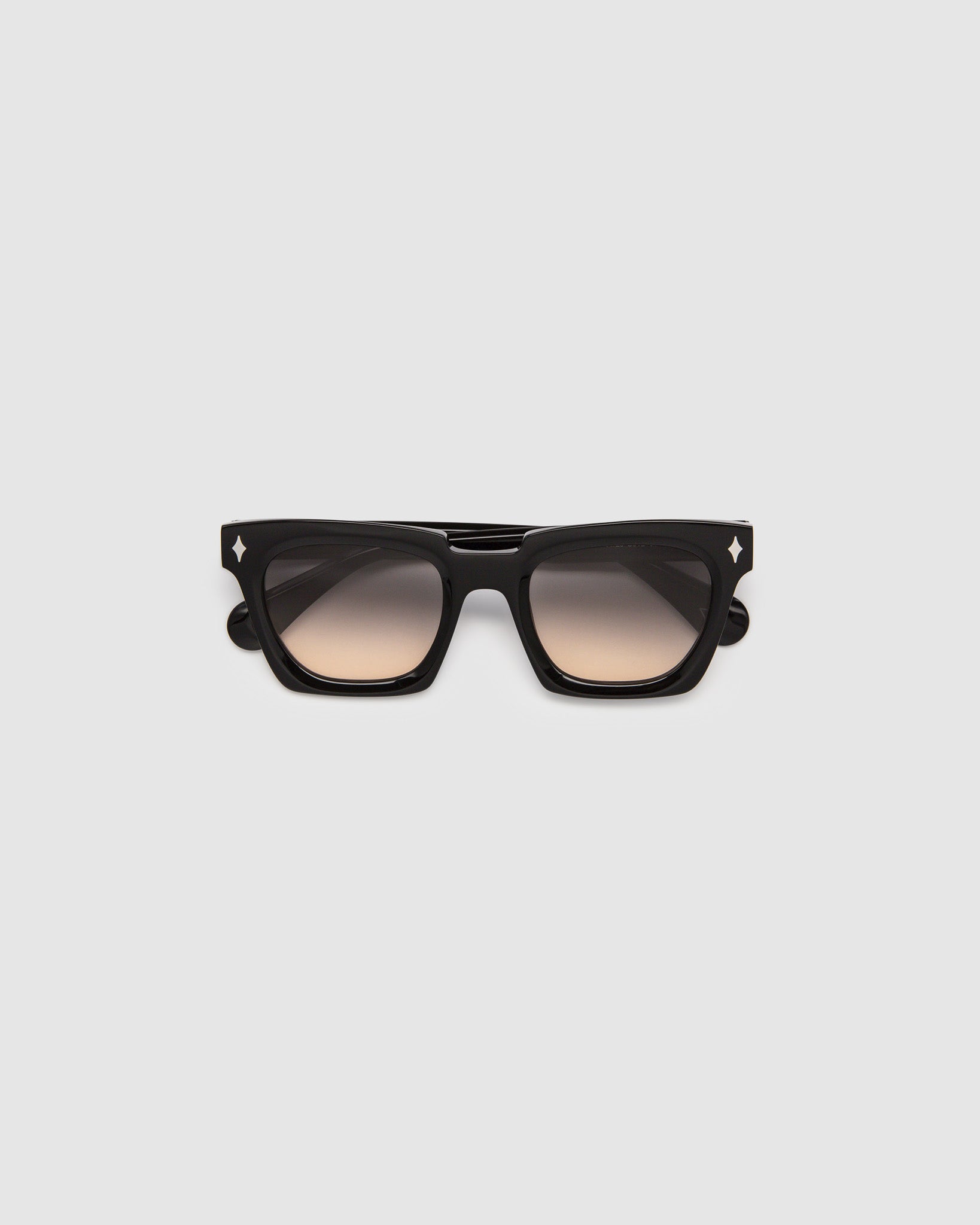 Brutal 1.0 Sunglasses by Tribu Eyewear — Black acetate square frame, dusk lens, flat view, grey background.