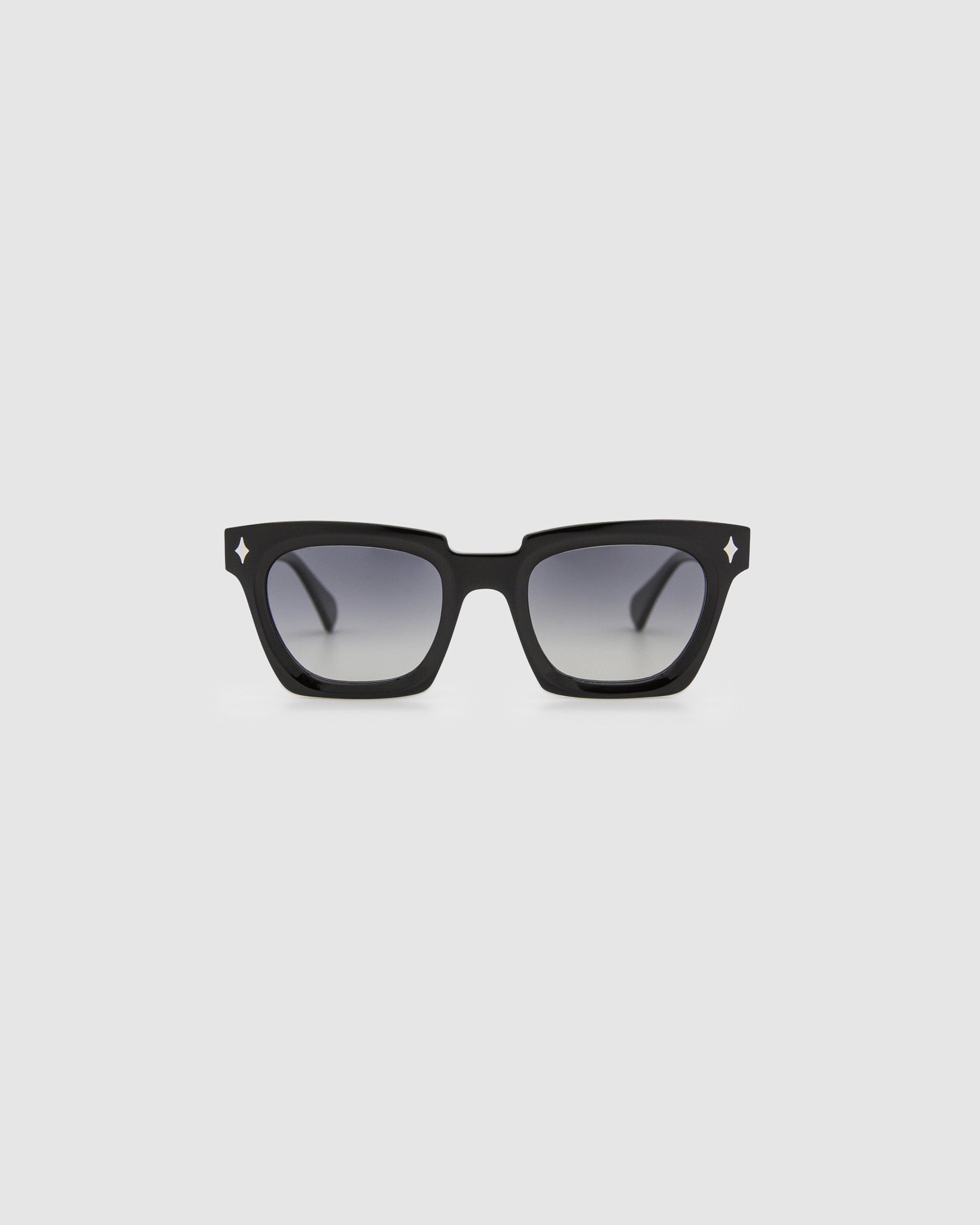 Brutal 1.0 Sunglasses by Tribu Eyewear — Black acetate square frame, grey gradient polarised front view on grey background.