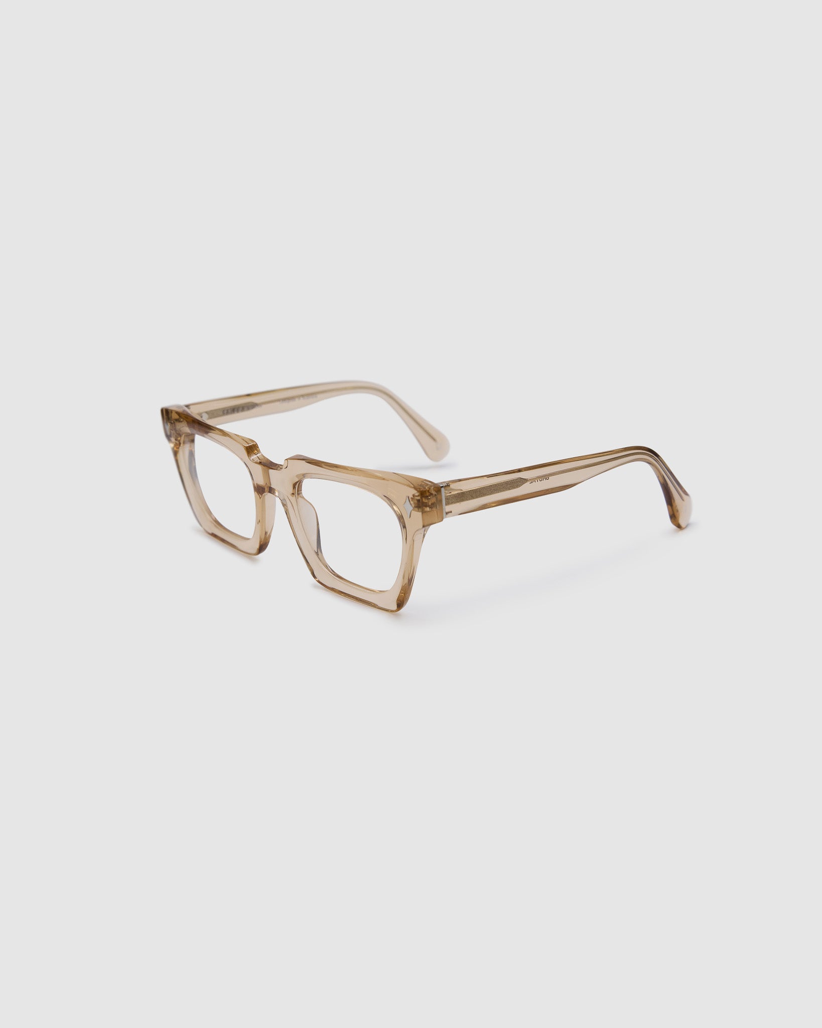 Brutal 1.0 Optical by Tribu Eyewear — Champagne Crystal square optical frame, side view studio lighting. 