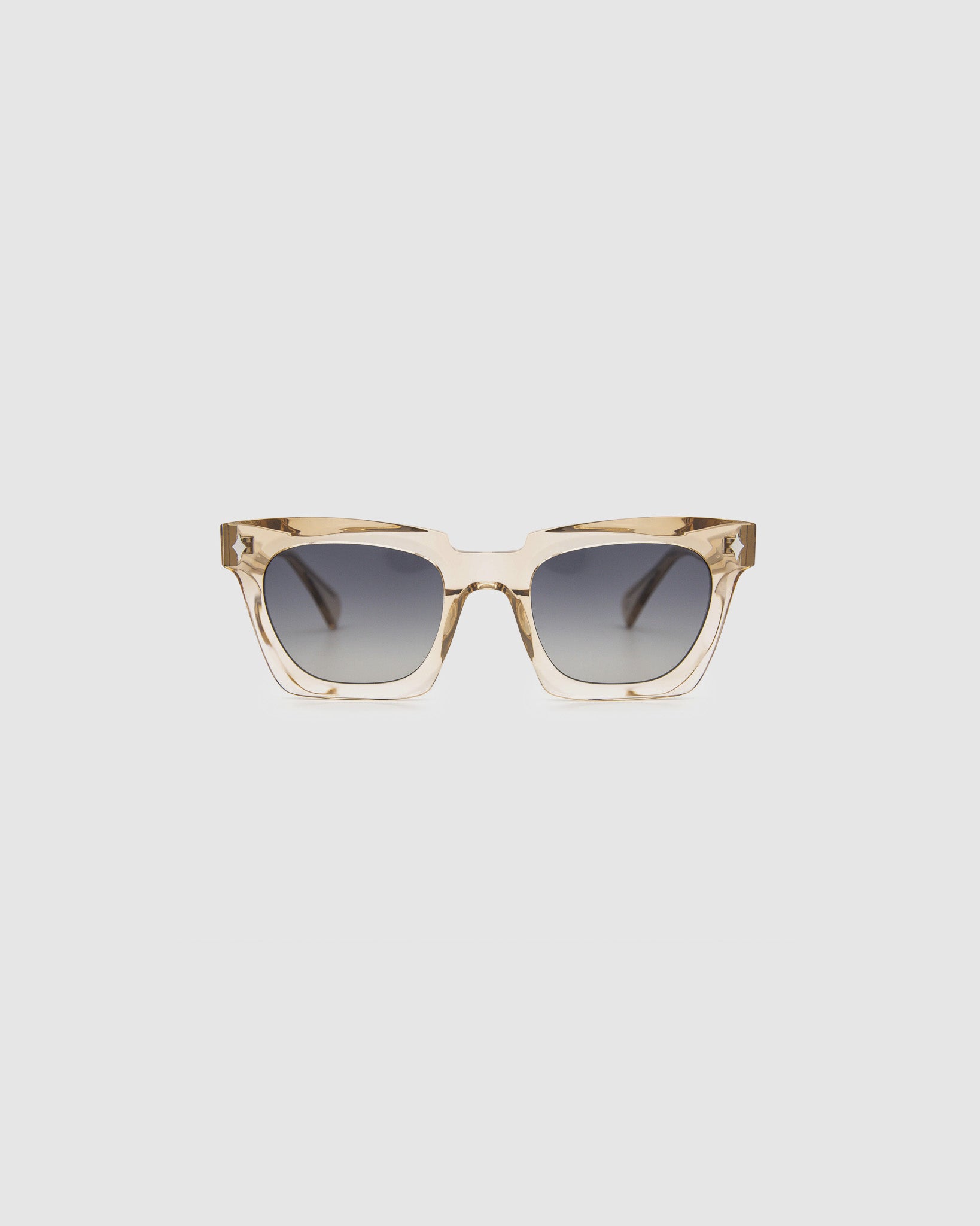 Brutal 1.0 Sunglasses by Tribu Eyewear — Champagne crystal acetate square frame, grey gradient polarised lens front view.