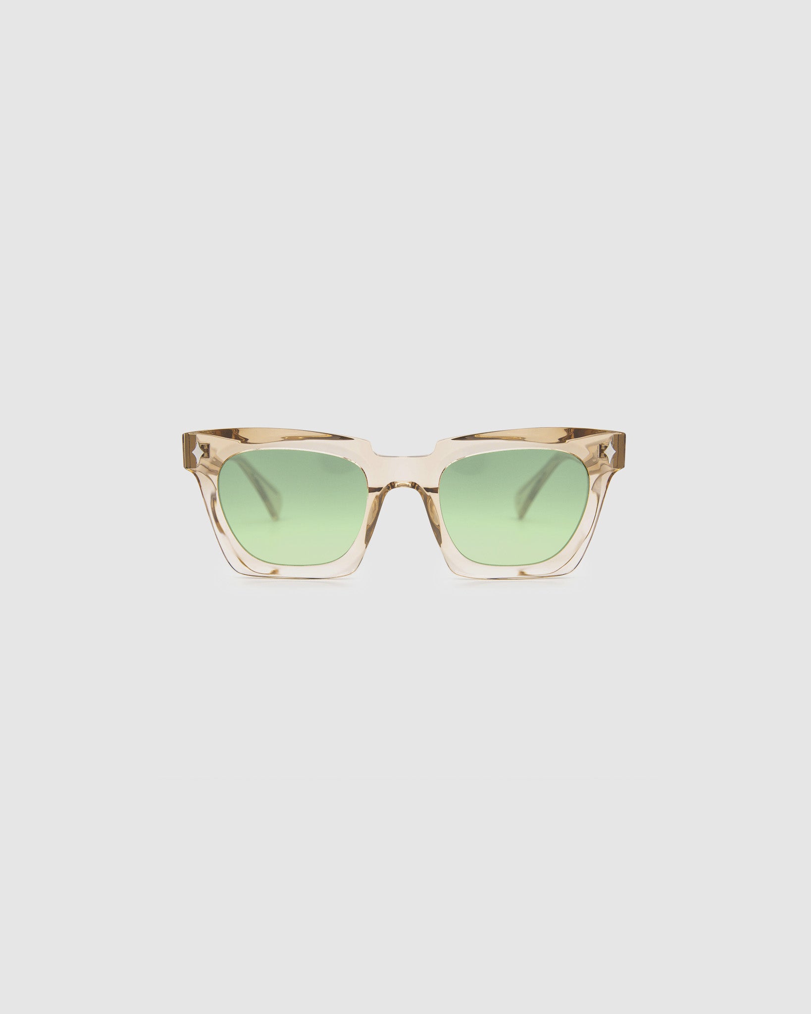 Brutal 1.0 Sunglasses by Tribu Eyewear — Champagne crystal acetate square frame, sage lens, front view, grey background.