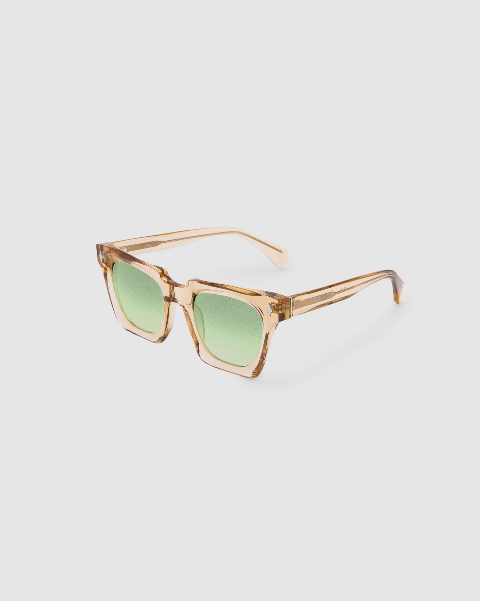 Brutal 1.0 Sunglasses by Tribu Eyewear — Champagne crystal acetate square frame, sage lens, side view, grey background.