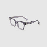 Brutal 1.0 Optical by Tribu Eyewear — Smoke Crystal square optical frame, side view studio lighting. 