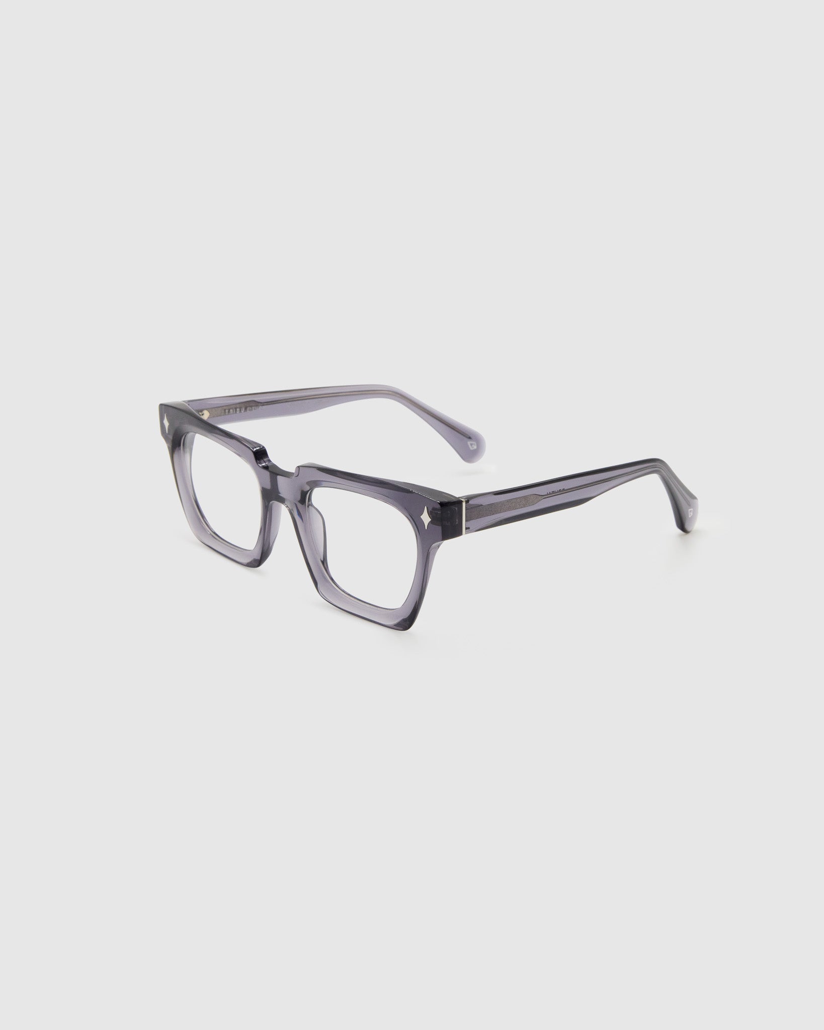 Brutal 1.0 Optical by Tribu Eyewear — Smoke Crystal square optical frame, side view studio lighting. 