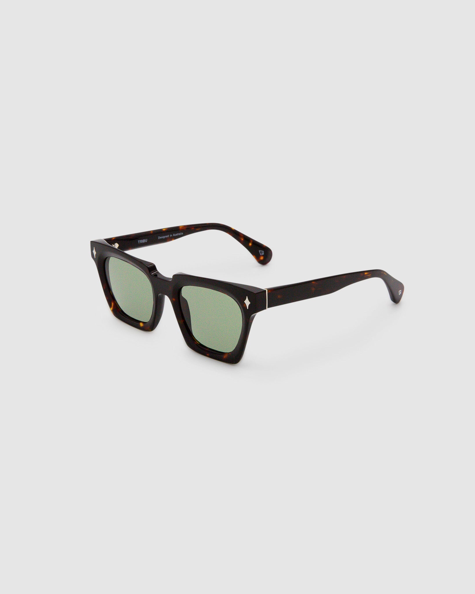 Brutal 1.0 Sunglasses by Tribu Eyewear — Tort acetate square frame, sage tint lens, side view, grey background.