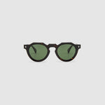 Brutal 2.0 Sunglasses by Tribu Eyewear — Green polarised lens in a round tort acetate frame, front view on grey background.