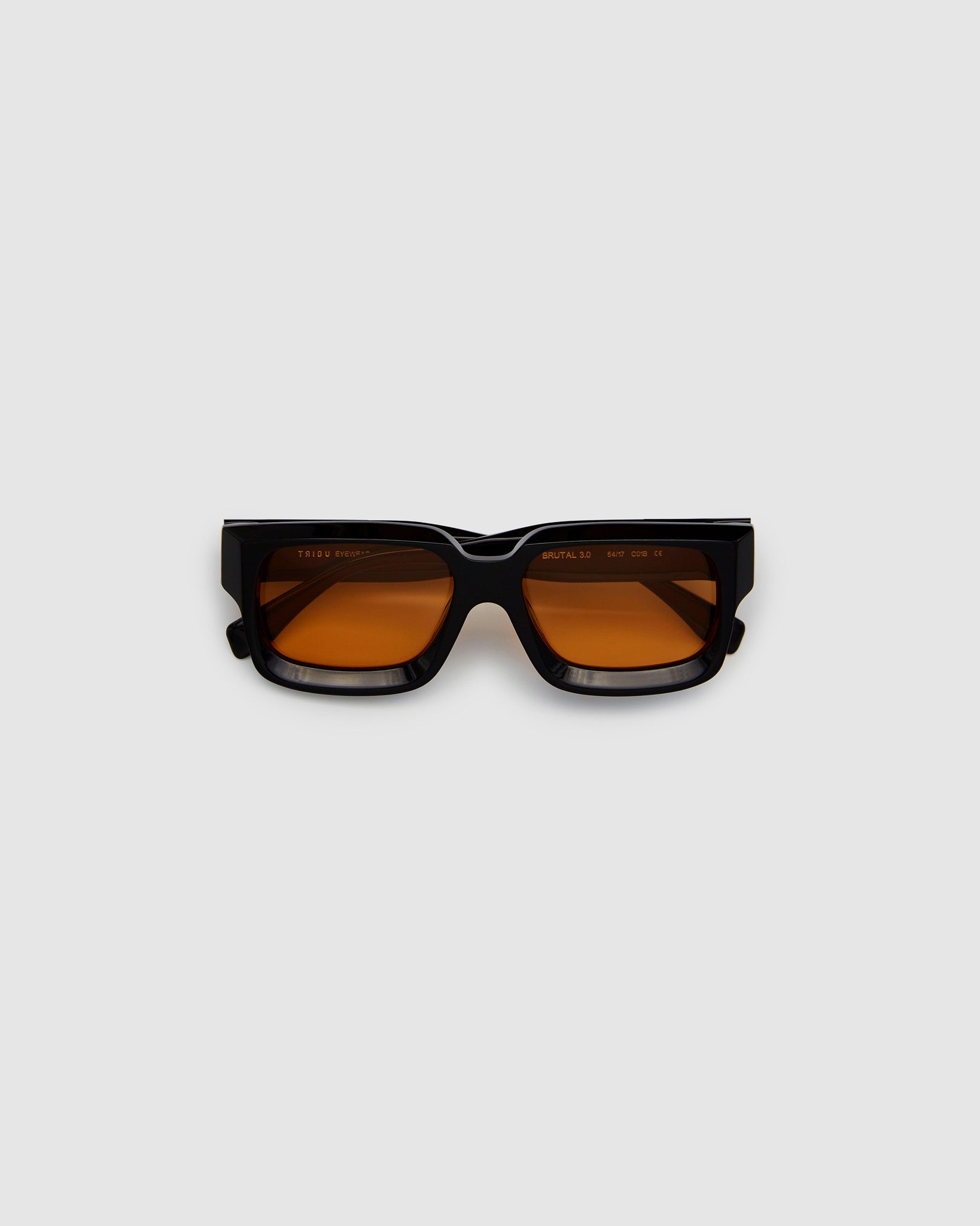 Brutal 3.0  Sunglasses by Tribu Eyewear — Black square acetate frame, Desert Orange lens, flat view light grey background.