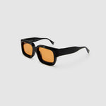 Brutal 3.0  Sunglasses by Tribu Eyewear — Black square acetate frame, Desert Orange lens, side view light grey background.