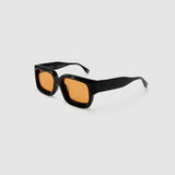 Brutal 3.0  Sunglasses by Tribu Eyewear — Black square acetate frame, Desert Orange lens, side view light grey background.