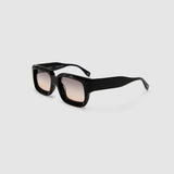 Brutal 3.0  Sunglasses by Tribu Eyewear — Black square acetate frame, dusk lens, side view light grey background.