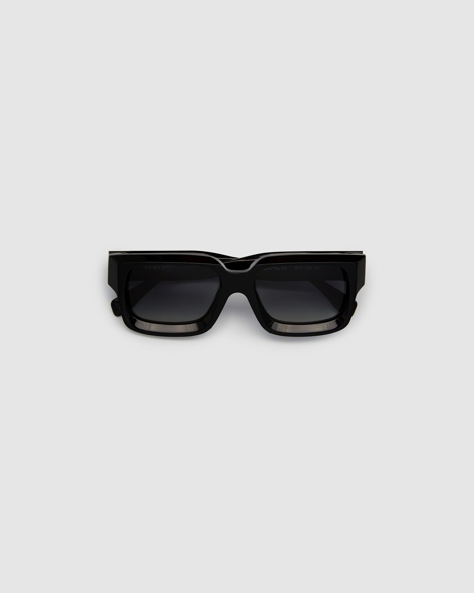 Brutal 3.0 Polarised Sunglasses by Tribu Eyewear — Black square frame, flat view light grey background.