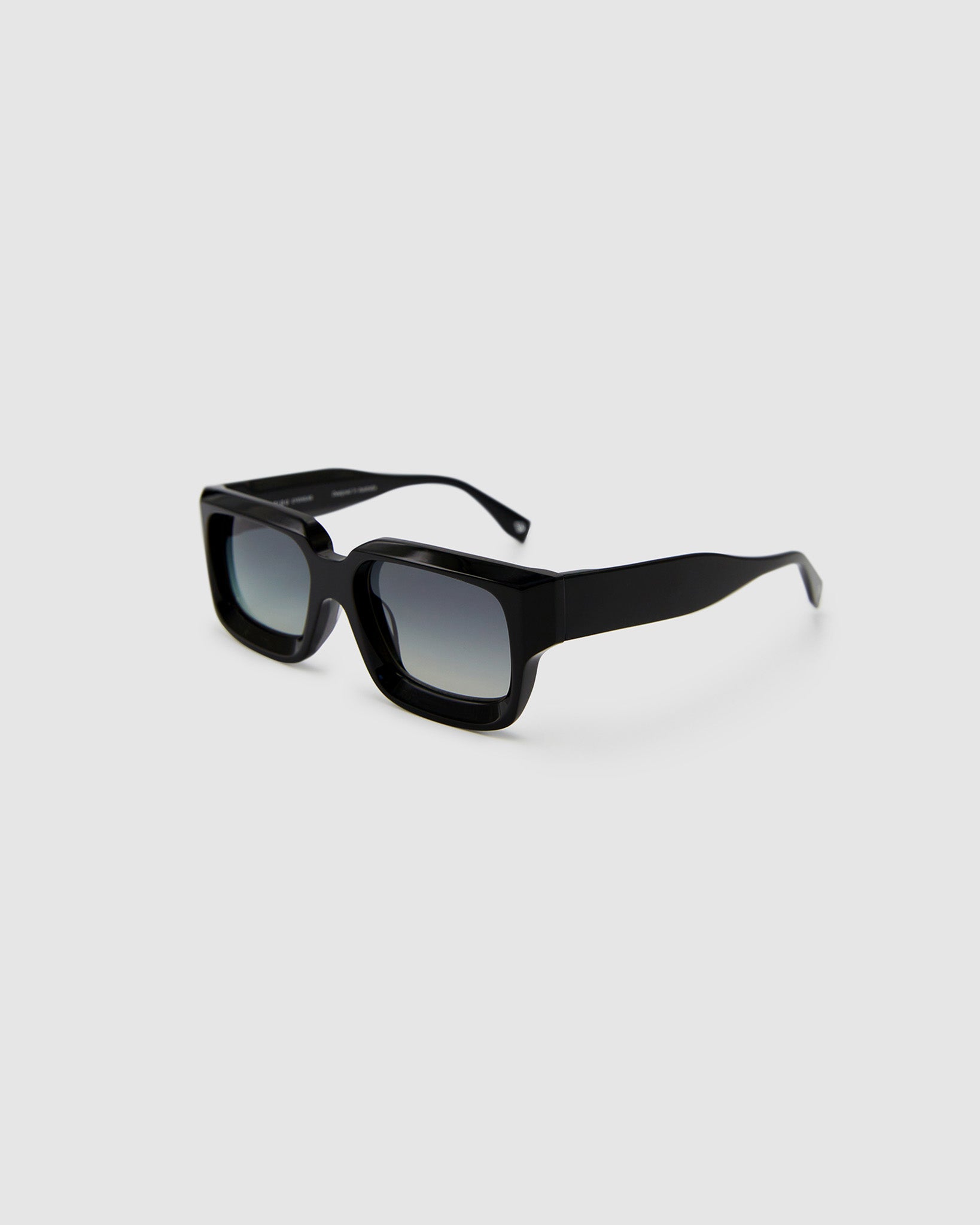 Brutal 3.0 Polarised Sunglasses by Tribu Eyewear — Black square frame, side view light grey background.