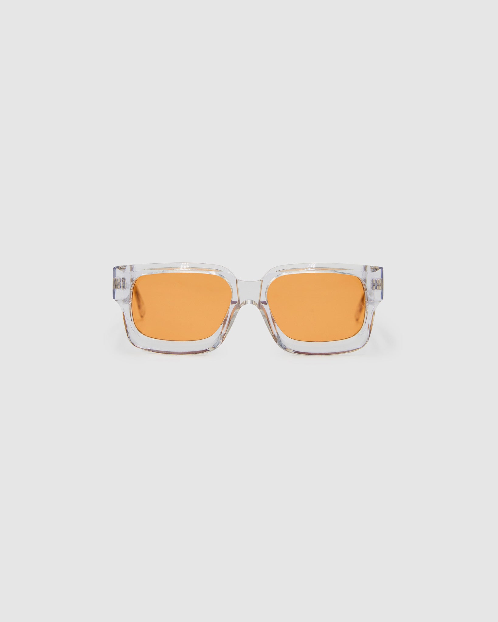 Brutal 3.0  Sunglasses by Tribu Eyewear — Crystal square acetate frame, sunset lens, front view light grey background.