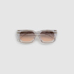 Brutal 3.0  Sunglasses by Tribu Eyewear — Crystal square acetate frame, dusk lens, flat view light grey background.
